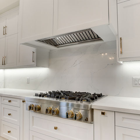 white kitchen cabinets with premium hardware